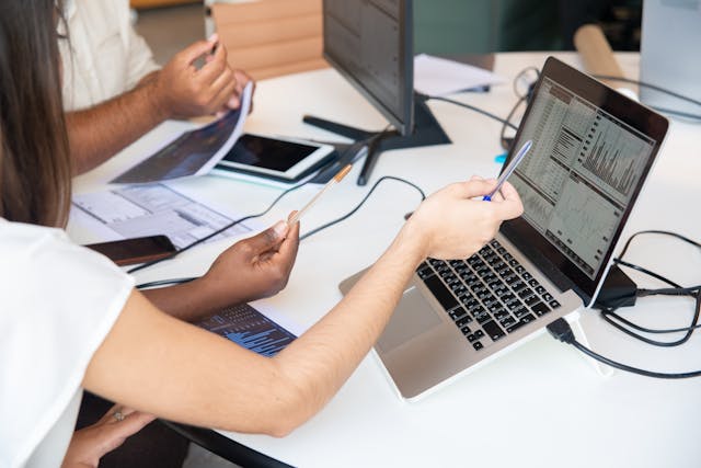 Photo by Kampus Production: https://www.pexels.com/photo/photograph-of-people-s-hands-pointing-to-a-laptop-with-charts-6248987/